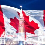 Relief of Parliament building with Canadian flag